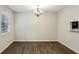 Bright dining room with wood floors, neutral paint, and natural light at 3135 Reeves Se St, Smyrna, GA 30080