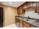 Kitchen with stainless steel appliances and updated countertops at 3135 Reeves Se St, Smyrna, GA 30080