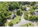 Aerial view of the property showcasing the home's location and community amenities like swim and tennis at 3310 Chartwell Blvd, Suwanee, GA 30024