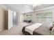 Spacious main bedroom has sitting area, tray ceiling and generous natural light at 3310 Chartwell Blvd, Suwanee, GA 30024