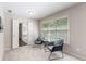 Bedroom sitting area is brightly illuminated with large windows at 3310 Chartwell Blvd, Suwanee, GA 30024