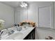 Bathroom featuring double sinks with elegant fixtures and plenty of countertop space at 3431-0 Tioga Lake Cv, Lawrenceville, GA 30044