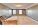Neutral bedroom with carpeted floors, natural light from windows, and a blank canvas at 3431-0 Tioga Lake Cv, Lawrenceville, GA 30044