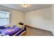 Bedroom with a hardwood floor, a window, and a door at 3431-0 Tioga Lake Cv, Lawrenceville, GA 30044