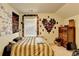 Eclectic bedroom with personal touches, natural light, and carpeted floors at 3431-0 Tioga Lake Cv, Lawrenceville, GA 30044