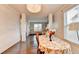 Bright dining room featuring a decorative chandelier and hardwood floors at 3431-0 Tioga Lake Cv, Lawrenceville, GA 30044