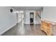 Spacious hallway features wood floors, staircase, and a convenient laundry closet with washer and dryer hookups at 3431-0 Tioga Lake Cv, Lawrenceville, GA 30044