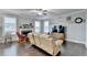 Spacious living room with fireplace, hardwood floors, and ample light at 3431-0 Tioga Lake Cv, Lawrenceville, GA 30044