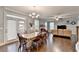 Open living space and dining area with hardwood floors and abundant natural light at 3431-0 Tioga Lake Cv, Lawrenceville, GA 30044