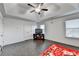 Bright main bedroom with trey ceilings, ceiling fan, and large windows for natural light at 3431-0 Tioga Lake Cv, Lawrenceville, GA 30044