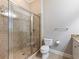 Updated bathroom featuring tiled shower with a glass door and updated fixtures and towel bars at 3930 Charleston Market St # 221, Suwanee, GA 30024