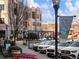 Street view featuring a Suwanee, Georgia banner and upscale buildings with retail spaces at 3930 Charleston Market St # 221, Suwanee, GA 30024