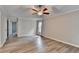This bright bedroom boasts new hardwood floors, ceiling fan and soft neutral walls at 425 Charlyne Way, Dacula, GA 30019