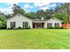 Charming single-story home with a well-maintained lawn and mature trees at 425 Charlyne Way, Dacula, GA 30019