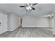 Open living room featuring hardwood floors, neutral paint and recessed lights at 425 Charlyne Way, Dacula, GA 30019
