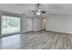 Open living room featuring hardwood floors, neutral paint and window at 425 Charlyne Way, Dacula, GA 30019