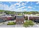 A vibrant shopping center showcasing a variety of storefronts with inviting entrances and manicured landscaping at 5686 Lawley Dr, Alpharetta, GA 30022