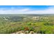 Aerial view showcases lush surroundings and the neighborhood's convenient location near green space at 6034 Addington Nw Dr, Acworth, GA 30101