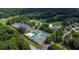 Expansive aerial shot of the community with tennis courts, pool, and golf course at 6034 Addington Nw Dr, Acworth, GA 30101