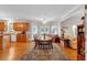Open dining area with hardwood floors, plenty of natural light, and adjacent to a modern kitchen at 6034 Addington Nw Dr, Acworth, GA 30101