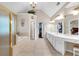 Bright, oversized main bathroom featuring double vanities, a garden tub, and large shower at 6034 Addington Nw Dr, Acworth, GA 30101