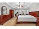 Large main bedroom with vaulted ceiling, ceiling fan, fireplace and generous storage at 6034 Addington Nw Dr, Acworth, GA 30101