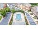 Overhead view of community pool with landscaping and surrounding townhomes at 2260 Edgartown Se Ln # 1, Smyrna, GA 30080