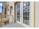 Charming balcony features French doors, detailed wrought-iron railing, and bright white brick at 2260 Edgartown Se Ln # 1, Smyrna, GA 30080