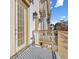 Elegant balcony with decorative railing and French doors, offering natural light at 2260 Edgartown Se Ln # 1, Smyrna, GA 30080