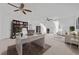 Office space with a ceiling fan, a desk, a bookcase, and bright light at 2260 Edgartown Se Ln # 1, Smyrna, GA 30080