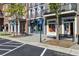 Street view of Ivy Walk, showcasing boutique storefronts and benches for seating at 2260 Edgartown Se Ln # 1, Smyrna, GA 30080