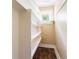 Pantry with built-in shelves and laminate flooring, offers ample storage space at 2497 Lakewood Sw Ave, Atlanta, GA 30315