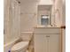 Cozy bathroom with a shower and single vanity and mirror, offering a practical and comfortable space for everyday use at 5452 Fountainhead Ln, Auburn, GA 30011