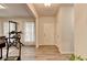 Versatile space with hardwood floors, a brightly lit entryway, and gym equipment at 5452 Fountainhead Ln, Auburn, GA 30011