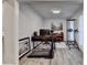 Comfortable space features a treadmill, piano, and large desk; a great place for music or work at 5452 Fountainhead Ln, Auburn, GA 30011