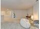 Spacious living area featuring a comfortable sofa, armchair, and stylish decor, creating a welcoming and versatile space at 5452 Fountainhead Ln, Auburn, GA 30011