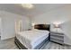 Bright main bedroom featuring a comfortable bed, nightstands, and soft, neutral decor at 5452 Fountainhead Ln, Auburn, GA 30011