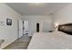 The main bedroom includes a walk-in closet, neutral walls, and soft, natural light at 5452 Fountainhead Ln, Auburn, GA 30011