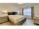 Serene main bedroom with soft lighting, a stylish bed, and coordinated nightstands at 5452 Fountainhead Ln, Auburn, GA 30011