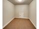 A carpeted bedroom shows a small closet in a room ready for your personal touch at 6405 Beaver Creek Trl, Atlanta, GA 30349