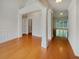 Bright living room featuring hardwood floors, white trim, and ample natural light at 6405 Beaver Creek Trl, Atlanta, GA 30349