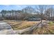 Spacious property featuring a charming home, large yard, and convenient road access at 9588 Poston Rd, Jonesboro, GA 30238