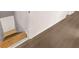 Finished basement features light wood floor and white wainscoting details at 9588 Poston Rd, Jonesboro, GA 30238