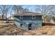 Basement featuring an exterior entrance at 9588 Poston Rd, Jonesboro, GA 30238
