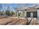 Carport with brick pillars and ample parking at 9588 Poston Rd, Jonesboro, GA 30238