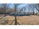 Cozy one-story home featuring a well-maintained lawn and a welcoming facade at 9588 Poston Rd, Jonesboro, GA 30238