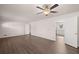 Open living room with ceiling fan and hardwood floors at 9588 Poston Rd, Jonesboro, GA 30238