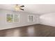Bright living room with hardwood floors and ceiling fan at 9588 Poston Rd, Jonesboro, GA 30238