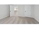 Bedroom featuring soft carpeting, neutral walls, and open doorway at 98 Longhorn Way, Auburn, GA 30011