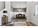 Open dining room area with luxury vinyl plank flooring, stylish decor and direct access to front entry at 98 Longhorn Way, Auburn, GA 30011
